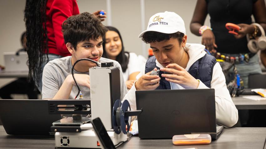 Students working together with computers